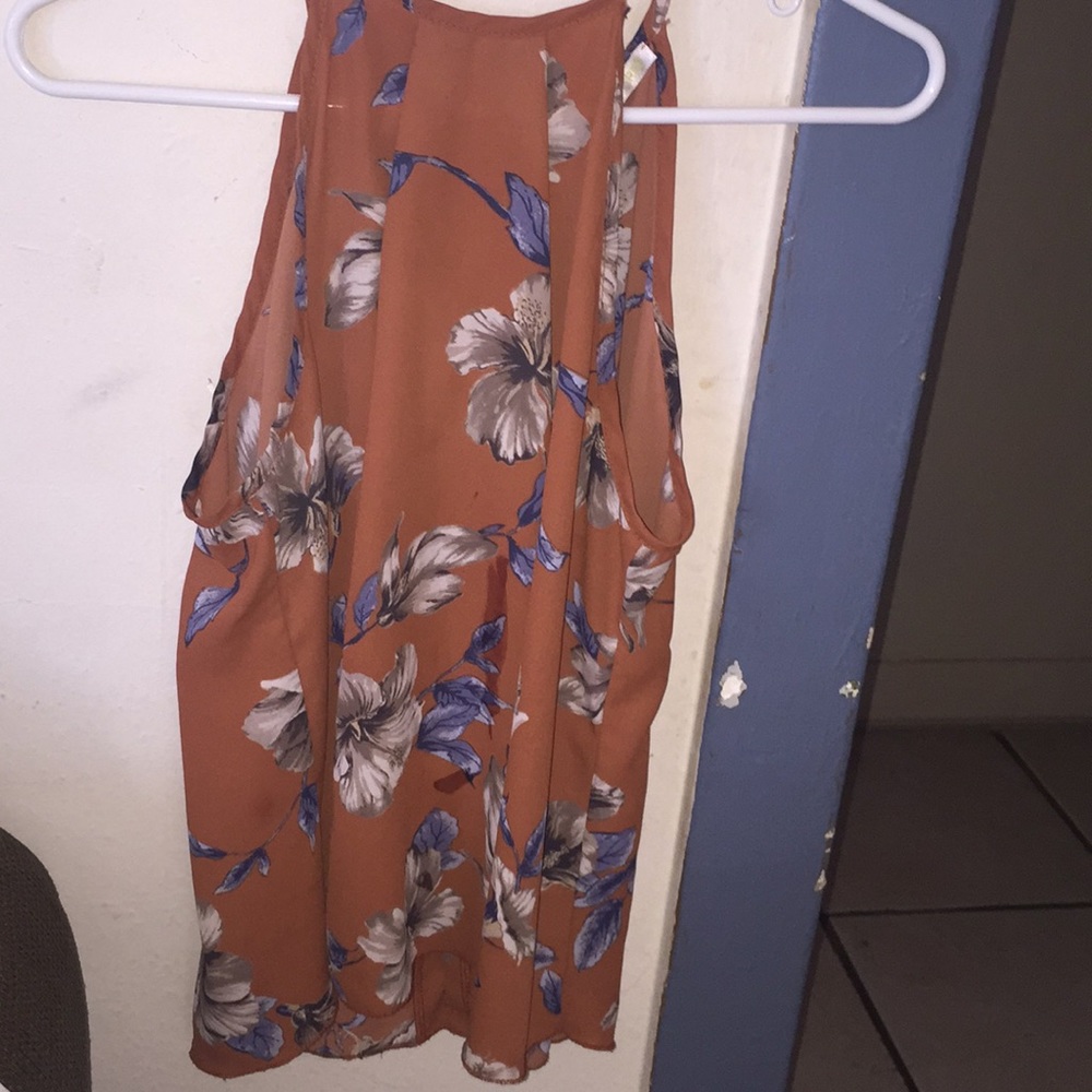 Orange summer shirt with flowers